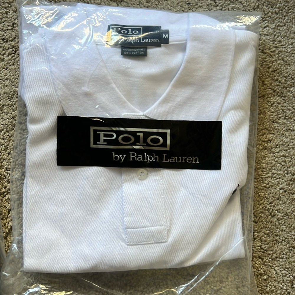 Ralph Lauren polo shirt medium 
New never worn, white